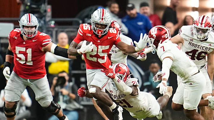 Ohio State Buckeyes running back Bo Jackson (25) runs through Indiana Hoosiers linebacker Rolijah Hardy (21) during the Big Ten Conference championship game at Lucas Oil Stadium in Indianapolis on Dec. 6, 2025. Ohio State lost 13-10. Ohio State Buckeyes running back Bo Jackson (25) runs through Indiana Hoosiers linebacker Rolijah Hardy (21) during the Big Ten Conference championship game at Lucas Oil Stadium in Indianapolis on Dec. 6, 2025. Ohio State lost 13-10.
