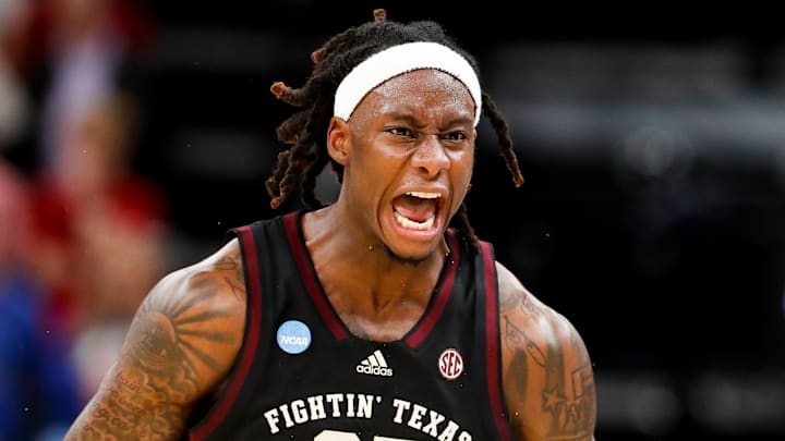 Texas A&M's Manny Obaseki (35) reacts after his team scored during the first round game between