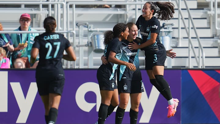 Aug 6, 2024; Kansas City, MO, USA; NJ/NY Gotham FC midfielder Delanie Sheehan (17) celebrates a goal with teammates in the second half against Angel City FC at CPKC Stadium. Mandatory Credit: Jay Biggerstaff-USA TODAY Sports