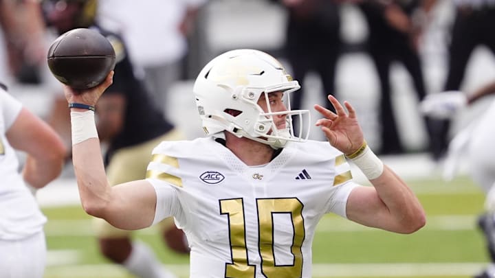 Aug 29, 2025; Boulder, Colorado, USA; Georgia Tech Yellow Jackets quarterback Haynes King (10) prepares to pass in the first quarter against the Colorado Buffaloes at Folsom Field. Mandatory Credit: Ron Chenoy-Imagn Images