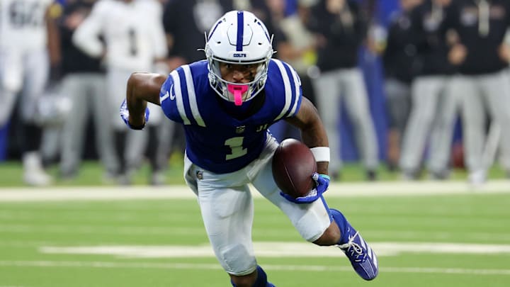 Oct 5, 2025; Indianapolis, Indiana, USA; Indianapolis Colts wide receiver Josh Downs (1) runs with the ball against the Las Vegas Raiders during the second half at Lucas Oil Stadium. Oct 5, 2025; Indianapolis, Indiana, USA; Indianapolis Colts wide receiver Josh Downs (1) runs with the ball against the Las Vegas Raiders during the second half at Lucas Oil Stadium.