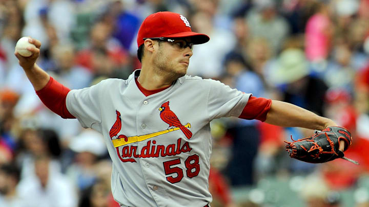Jul 25, 2014; Chicago, IL, USA; St. Louis Cardinals starting pitcher Joe Kelly (58) delivers in the first inning against the Chicago Cubs at Wrigley Field. Mandatory Credit: Matt Marton-Imagn Images