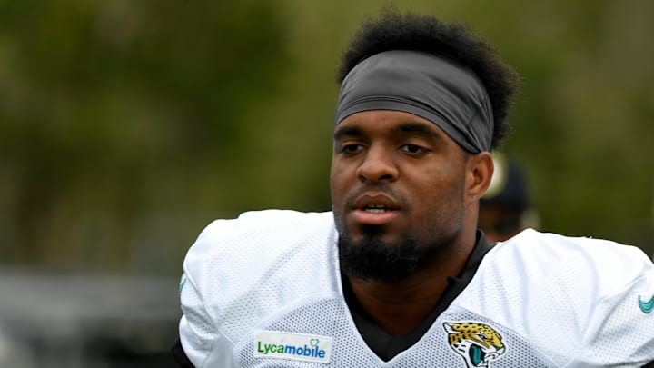 Aug 1, 2019; Jacksonville, FL, USA; Jacksonville Jaguars linebacker Joe Giles-Harris (57) enters the field for training camp at Dream Finders Homes Practice Complex. Mandatory Credit: Douglas DeFelice-Imagn Images
