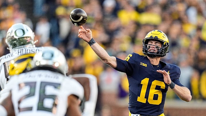 Michigan quarterback Davis Warren (16) makes a pass against Oregon during the second half at Michigan Stadium in Ann Arbor on Saturday, Nov. 2, 2024.