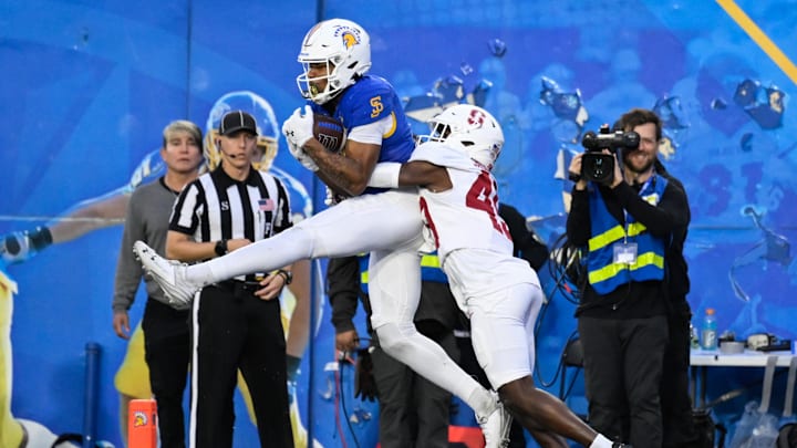 Nov 29, 2024; San Jose, California, USA; San Jose State Spartans wide receiver TreyShun Hurry (2) catches a touchdown pass against Stanford Cardinal cornerback Evan Jackson (49) in the fourth quarter at CEFCU Stadium. Mandatory Credit: Eakin Howard-Imagn Images Nov 29, 2024; San Jose, California, USA; San Jose State Spartans wide receiver TreyShun Hurry (2) catches a touchdown pass against Stanford Cardinal cornerback Evan Jackson (49) in the fourth quarter at CEFCU Stadium. Mandatory Credit: Eakin Howard-Imagn Images