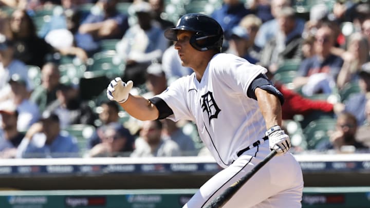 Detroit Tigers catcher Dustin Garneau (64) hits a single in the third inning against the Boston Red Sox at Comerica Park. Detroit Tigers catcher Dustin Garneau (64) hits a single in the third inning against the Boston Red Sox at Comerica Park.