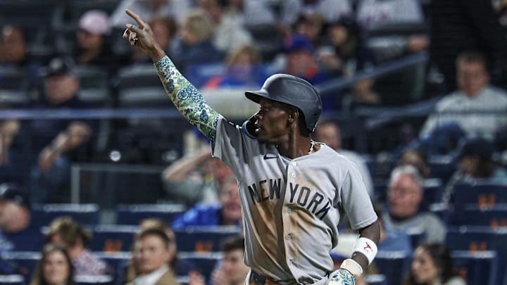 New York Yankees second baseman Jazz Chisholm Jr. (13) reacts after scoring a run during the fifth inning against the New York Mets at Citi Field.