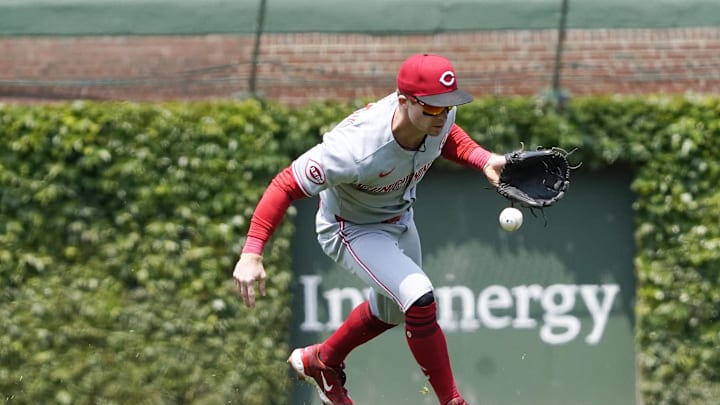 Jun 1, 2025; Chicago, Illinois, USA; Cincinnati Reds second baseman Matt McLain (9) loses the ball in the sun against the Chicago Cubs during the third inning at Wrigley Field. Mandatory Credit: David Banks-Imagn Images