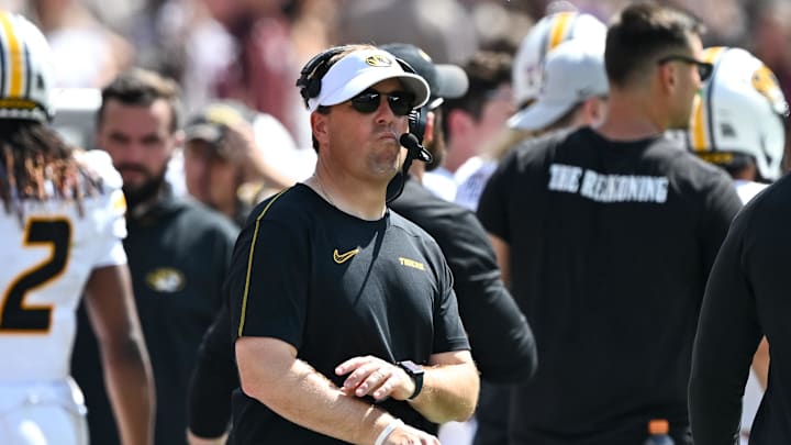 Oct 5, 2024; College Station, Texas, USA; Missouri Tigers head coach Eli Drinkwitz looks on In the third quarter against the Texas A&M Aggies at Kyle Field. Mandatory Credit: Maria Lysaker-Imagn Images. Oct 5, 2024; College Station, Texas, USA; Missouri Tigers head coach Eli Drinkwitz looks on In the third quarter against the Texas A&M Aggies at Kyle Field. Mandatory Credit: Maria Lysaker-Imagn Images.