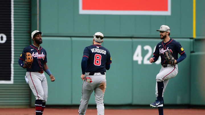 May 18, 2025; Boston, Massachusetts, USA;  Atlanta Braves center fielder Michael Harris II (23) left fielder Alex Verdugo (8) and right fielder Eli White (36) react after defeating the Boston Red Sox at Fenway Park. Mandatory Credit: Bob DeChiara-Imagn Images