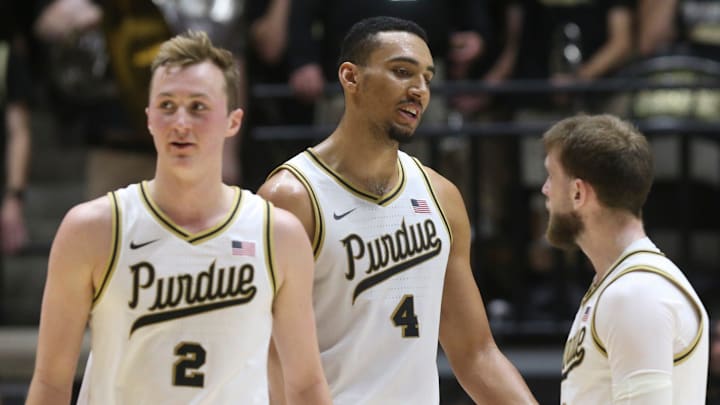 Purdue Boilermakers guard Fletcher Loyer (2), forward Trey Kaufman-Renn (4), and guard Braden Smith (3) huddle up 