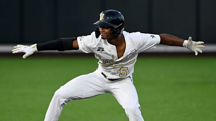 Vanderbilt   s Enrique Bradfield Jr. (51) celebrates after hitting a double to right field against Eastern Illinois in the third inning of an NCAA college baseball tournament regional game Friday, June 2, 2023, in Nashville, Tenn.