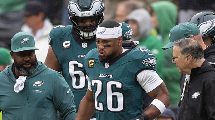 Philadelphia Eagles running back Saquon Barkley (26) is helped off the field after being injured against the Los Angeles Rams at Lincoln Financial Field. Philadelphia Eagles running back Saquon Barkley (26) is helped off the field after being injured against the Los Angeles Rams at Lincoln Financial Field.