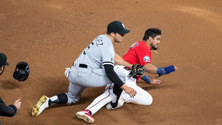 Minnesota Twins second baseman Luis Arraez (2) slides into Chicago White Sox designated hitter Yolmer Sanchez (5) tag in the sixth inning at Target Field in 2020.