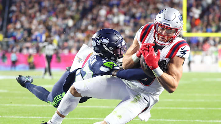 Feb 8, 2026; Santa Clara, CA, USA; New England Patriots wide receiver Mack Hollins (13) makes a catch to score a touchdown against Seattle Seahawks cornerback Riq Woolen (27) during the fourth quarter in Super Bowl LX at Levi's Stadium. Mandatory Credit: Mark J. Rebilas-Imagn Images Feb 8, 2026; Santa Clara, CA, USA; New England Patriots wide receiver Mack Hollins (13) makes a catch to score a touchdown against Seattle Seahawks cornerback Riq Woolen (27) during the fourth quarter in Super Bowl LX at Levi's Stadium. Mandatory Credit: Mark J. Rebilas-Imagn Images