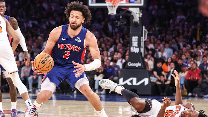 Apr 19, 2025; New York, New York, USA; New York Knicks forward OG Anunoby (8) falls down while guarding Detroit Pistons guard Cade Cunningham (2) in Game One of the First Round of the NBA Playoffs at Madison Square Garden. Mandatory Credit: Wendell Cruz-Imagn Images