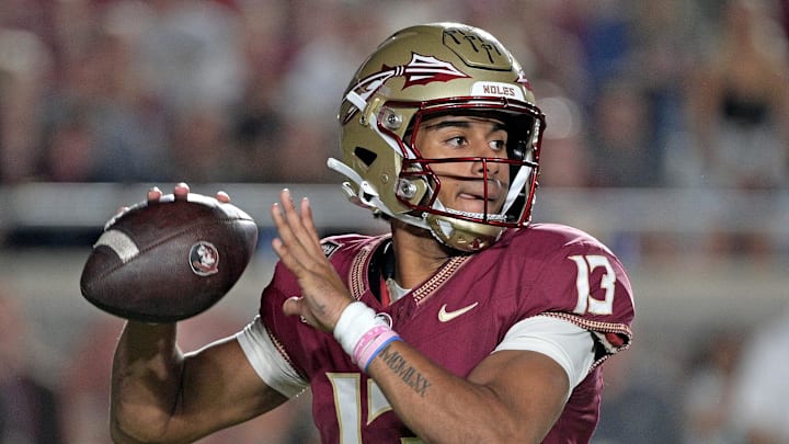 Oct 21, 2023; Tallahassee, Florida, USA; Florida State Seminoles quarterback Jordan Travis (13) looks to throw during the first half against the Duke Blue Devils at Doak S. Campbell Stadium. Mandatory Credit: Melina Myers-Imagn Images
