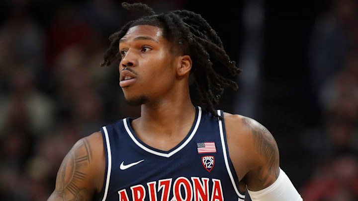 Arizona Wildcats guard Caleb Love (2) drives to the basket during the NCAA men   s basketball game