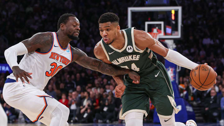 Dec 25, 2023; New York, New York, USA; Milwaukee Bucks forward Giannis Antetokounmpo (34) dribbles against New York Knicks forward Julius Randle (30) during the second half at Madison Square Garden. Mandatory Credit: Vincent Carchietta-USA TODAY Sports