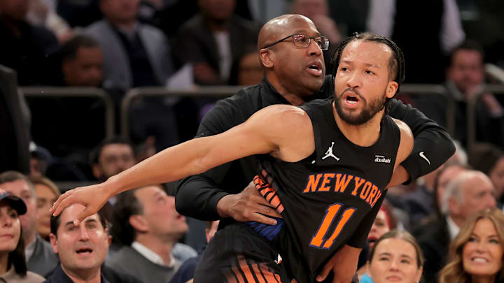 Jan 27, 2026; New York, New York, USA; New York Knicks head coach Mike Brown helps guard Jalen Brunson (11) get back up after falling down during the first quarter against the Sacramento Kings at Madison Square Garden. Mandatory Credit: Brad Penner-Imagn Images Jan 27, 2026; New York, New York, USA; New York Knicks head coach Mike Brown helps guard Jalen Brunson (11) get back up after falling down during the first quarter against the Sacramento Kings at Madison Square Garden. Mandatory Credit: Brad Penner-Imagn Images