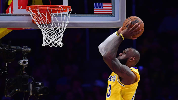 Apr 30, 2025; Los Angeles, California, USA; Los Angeles Lakers forward LeBron James (23) moves in for the dunk 