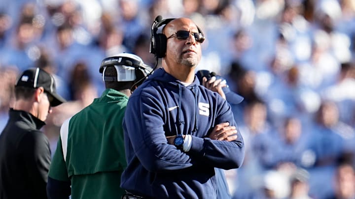 Penn State coach James Franklin looks to the scoreboard during a game against the Ohio State Buckeyes at Beaver Stadium.