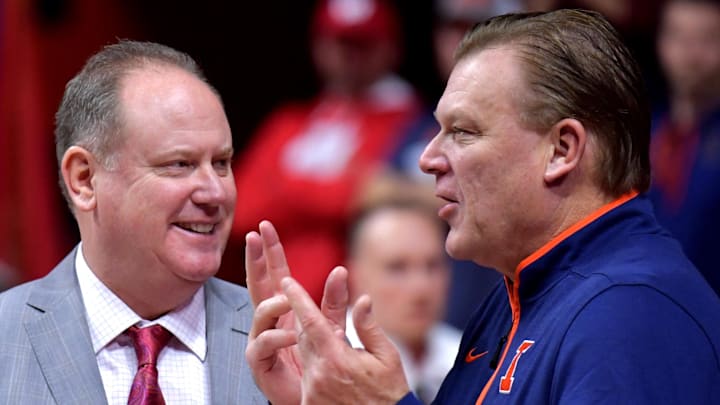 Dec 10, 2024; Champaign, Illinois, USA;  Wisconsin Badgers head coach Greg Gard, left, and Illinois Fighting Illini head coach Brad Underwood before a game at State Farm Center. Mandatory Credit: Ron Johnson-Imagn Images