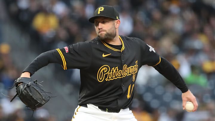 Apr 4, 2025; Pittsburgh, Pennsylvania, USA;  Pittsburgh Pirates relief pitcher Tim Mayza (18) pitches against the New York Yankees during the sixth inning at PNC Park. Mandatory Credit: Charles LeClaire-Imagn Images