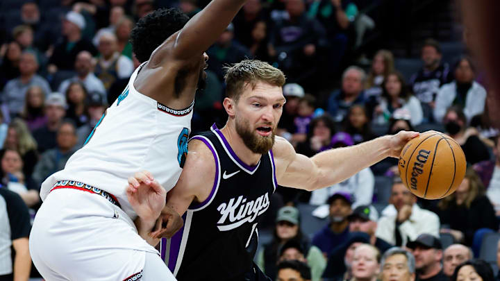Mar 17, 2025; Sacramento, California, USA; Sacramento Kings forward Domantas Sabonis (11) dribbles the ball against Memphis Grizzlies forward Jaren Jackson Jr. (13) during the second quarter at Golden 1 Center. Mandatory Credit: Sergio Estrada-Imagn Images Mar 17, 2025; Sacramento, California, USA; Sacramento Kings forward Domantas Sabonis (11) dribbles the ball against Memphis Grizzlies forward Jaren Jackson Jr. (13) during the second quarter at Golden 1 Center. Mandatory Credit: Sergio Estrada-Imagn Images