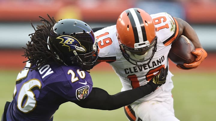Dec 17, 2017; Cleveland, OH, USA; Baltimore Ravens cornerback Maurice Canady (26) tackles Cleveland Browns wide receiver Corey Coleman (19) during the second half at FirstEnergy Stadium. Mandatory Credit: Ken Blaze-Imagn Images