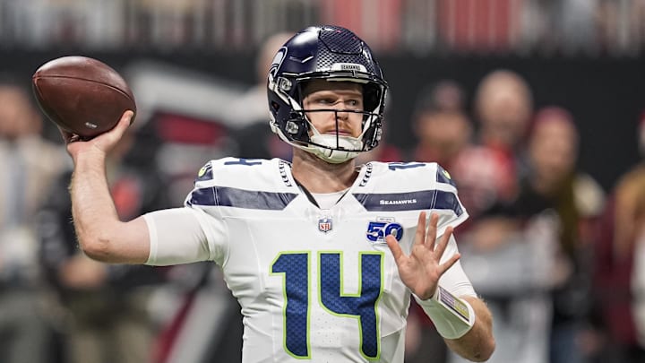 Dec 7, 2025; Atlanta, Georgia, USA; Seattle Seahawks quarterback Sam Darnold (14) warms up on the field prior to the game against the Atlanta Falcons at Mercedes-Benz Stadium. Dec 7, 2025; Atlanta, Georgia, USA; Seattle Seahawks quarterback Sam Darnold (14) warms up on the field prior to the game against the Atlanta Falcons at Mercedes-Benz Stadium.