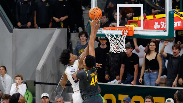 Washington Huskies guard Zoom Diallo (5) has his shot blocked by Baylor Bears center Caden Powell (44) during the second half at Paul and Alejandra Foster Pavilion