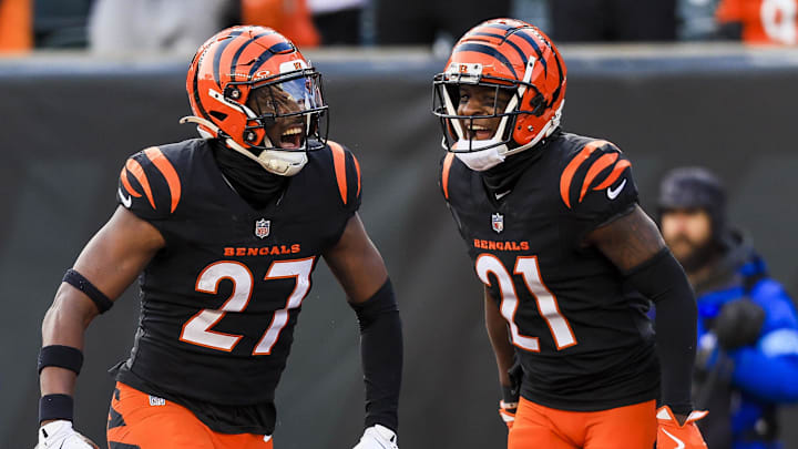Dec 22, 2024; Cincinnati, Ohio, USA; Cincinnati Bengals safety Jordan Battle (27) reacts after a play with cornerback Mike Hilton (21) in the second half against the Cleveland Browns at Paycor Stadium. Mandatory Credit: Katie Stratman-Imagn Images