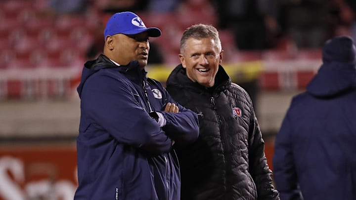 Brigham Young Cougars head coach Kalani Sitake, left and Utah Utes head coach Kyle Whittingham get together prior to their game at Rice-Eccles Stadium. Brigham Young Cougars head coach Kalani Sitake, left and Utah Utes head coach Kyle Whittingham get together prior to their game at Rice-Eccles Stadium.