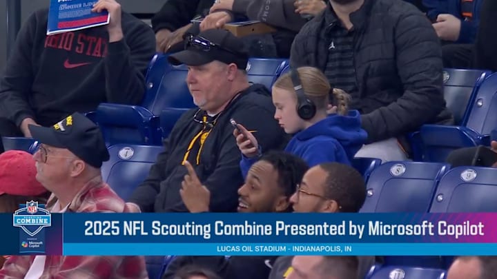 A shot of the crowd, featuring young NFL fan Lucy Callery, during the NFL combine on Feb. 28, 2025.