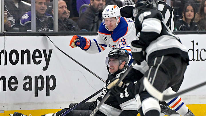 Los Angeles Kings center Anze Kopitar (11) and Edmonton Oilers left wing Zach Hyman (18)