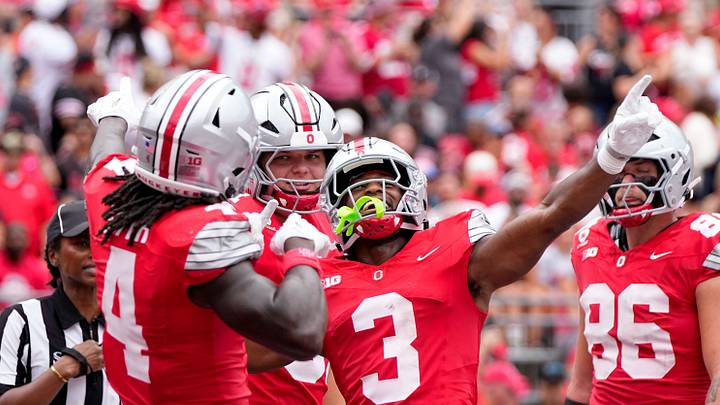 Ohio State Buckeyes wide receiver Devin McCuin (3) celebrates with wide receiver Jeremiah Smith (4) after Smith scored a touchdown in the first half of the NCAA football game at Ohio Stadium on Sept. 5, 2026 in Columbus, Ohio. Ohio State Buckeyes wide receiver Devin McCuin (3) celebrates with wide receiver Jeremiah Smith (4) after Smith scored a touchdown in the first half of the NCAA football game at Ohio Stadium on Sept. 5, 2026 in Columbus, Ohio.
