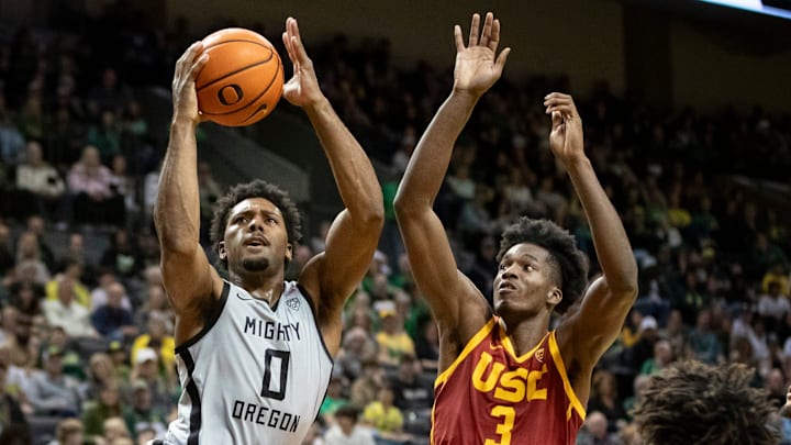 Oregon guard Kario Oquendo goes up for a shot when the Oregon Ducks defeated the USC Trojans. Oregon guard Kario Oquendo goes up for a shot when the Oregon Ducks defeated the USC Trojans.