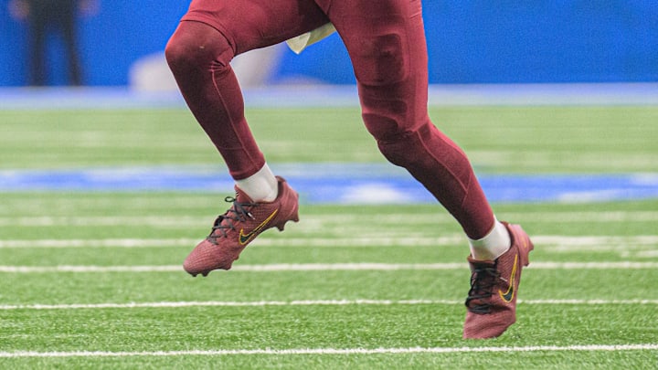 Washington Commanders quarterback Jayden Daniels wears custom Nike Kobe cleats.