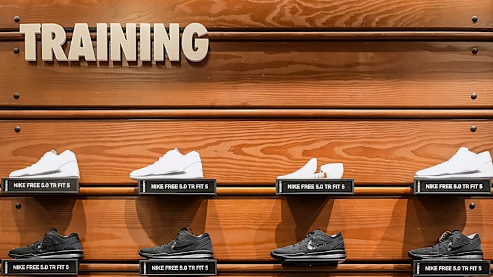 Nike training shoe display in a Nike store...