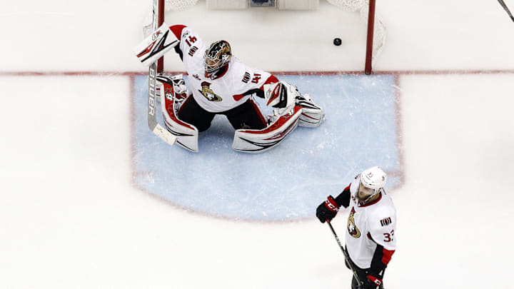 May 25, 2017; Pittsburgh, PA, USA;  Ottawa Senators goalie Craig Anderson (41) and defenseman Marc Methot (3) react to the game winning goal by Pittsburgh Penguins left wing Chris Kunitz (not pictured) in the second overtime in game seven of the Eastern Conference Final of the 2017 Stanley Cup Playoffs at the PPG PAINTS Arena. Mandatory Credit: Charles LeClaire-Imagn Images