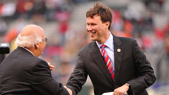 July 16, 2010; San Francisco, CA, USA; San Francisco Giants broadcaster Dave Flemming (right) shakes hands with hall of fame inductee broadcaster Jon Miller (left) during the Giants' tribute to Miller before the game against the New York Mets at AT&T Park. The Mets defeated the Giants 1-0. Mandatory Credit: Kyle Terada-Imagn Images