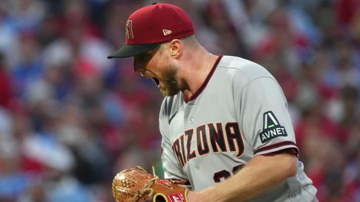 Arizona Diamondbacks pitcher Merrill Kelly (29) celebrates a strikeout against the Philadelphia Phillies during Game 2 of the NLCS at Citizens Bank Park in Philadelphia on Oct. 23, 2023. Arizona Diamondbacks pitcher Merrill Kelly (29) celebrates a strikeout against the Philadelphia Phillies during Game 2 of the NLCS at Citizens Bank Park in Philadelphia on Oct. 23, 2023.