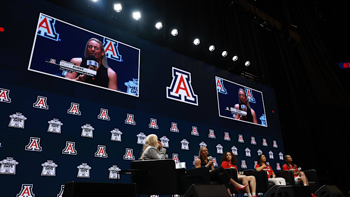 Oct 21, 2025; Kansas City, MO, USA; Arizona head coach Becky Burke (left) and Mickayla Perdue, Sumayah Sugapong and Noelani Cornfield speaks to media during Big 12 Womenís Basketball Media Day at T-Mobile Center. Mandatory Credit: Sophia Scheller-Imagn Images Oct 21, 2025; Kansas City, MO, USA; Arizona head coach Becky Burke (left) and Mickayla Perdue, Sumayah Sugapong and Noelani Cornfield speaks to media during Big 12 Womenís Basketball Media Day at T-Mobile Center. Mandatory Credit: Sophia Scheller-Imagn Images