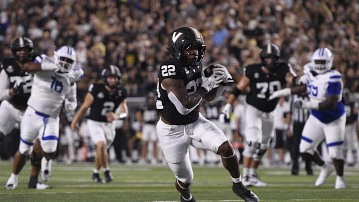 Sep 20, 2025; Nashville, Tennessee, USA;  Vanderbilt Commodores running back Makhilyn Young (22) runs with the ball against the Georgia State Panthers during the first half at FirstBank Stadium. Mandatory Credit: Steve Roberts-Imagn Images