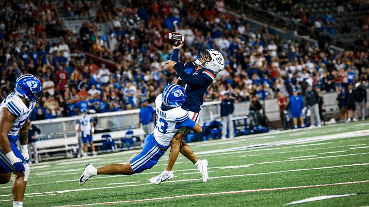 BYU defensive end Tausili Akana pressures Noah Fifita in Cougars' win over Arizona BYU defensive end Tausili Akana pressures Noah Fifita in Cougars' win over Arizona