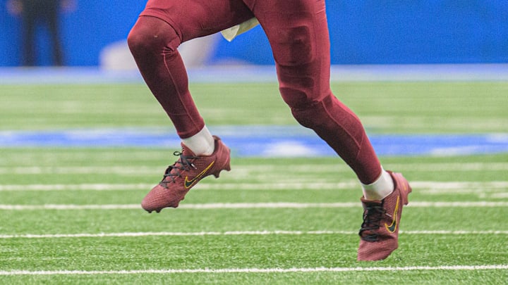 Washington Commanders quarterback Jayden Daniels wears custom Nike Kobe cleats.