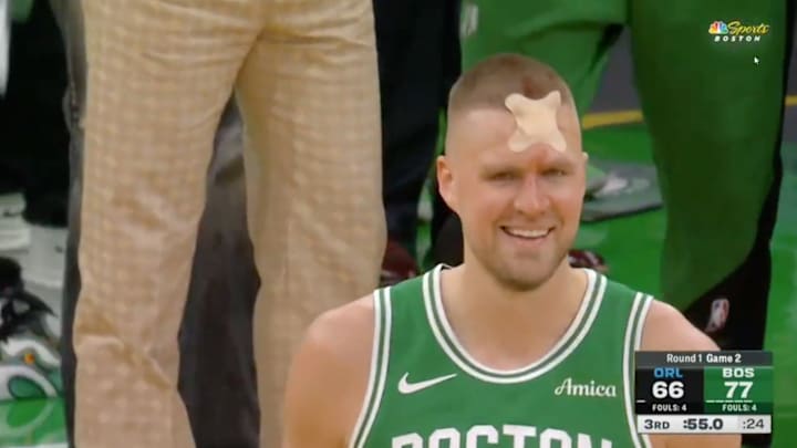 Boston Celtics' Kristap Porzingis with a big bandage on his forehead during Game 2 vs. the Orlando Magic on April 23, 2025.