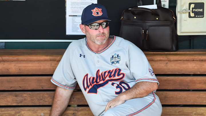 Jun 20, 2022; Omaha, NE, USA;  Auburn Tigers head coach Butch Thompson (30) awaits the start of the
