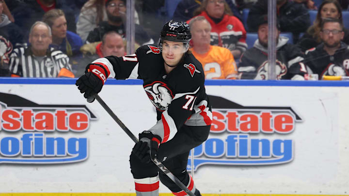 Apr 6, 2026; Buffalo, New York, USA;  Buffalo Sabres center Ryan McLeod (71) makes a pass during the third period against the Tampa Bay Lightning at KeyBank Center. Mandatory Credit: Timothy T. Ludwig-Imagn Images
